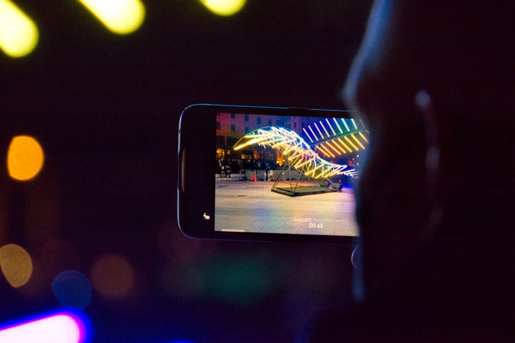 Smartphone showing live TV channels for the best streaming apps for live tv 2026